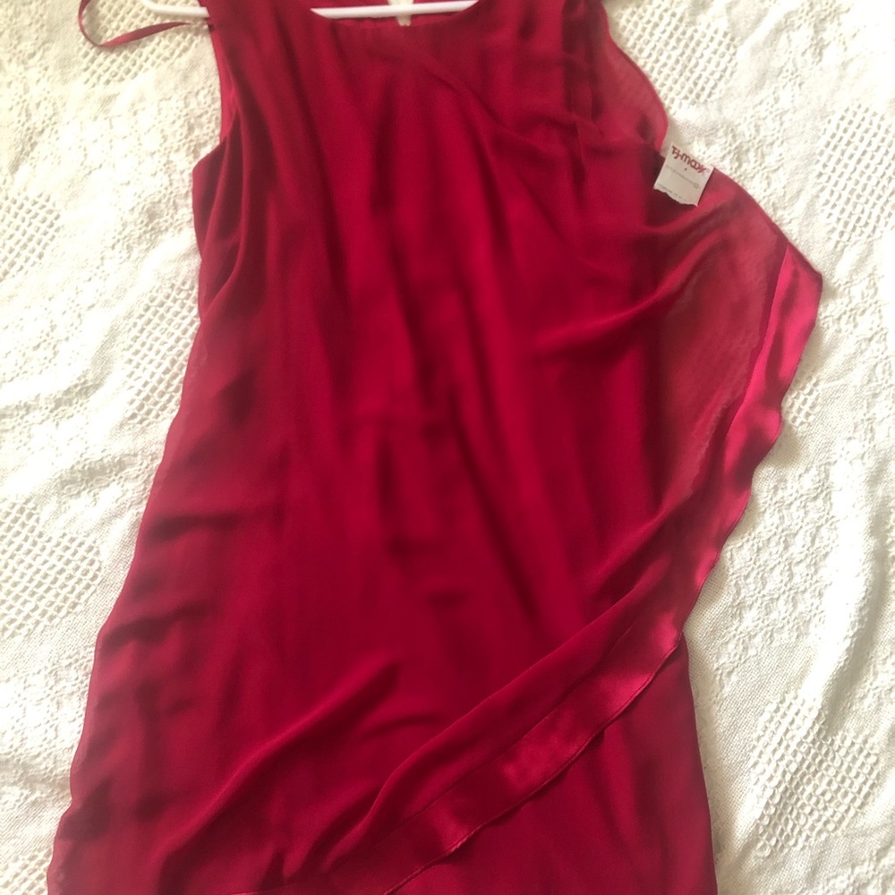 Brand new dress with tag from TJMaxx. Size 10, beautiful red with rhinestones.